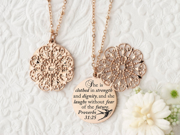 She is clothed in strength and dignity, and she laughs without fear of the future. Proverbs 31:25 - Rose Gold Quote Pendant Necklace