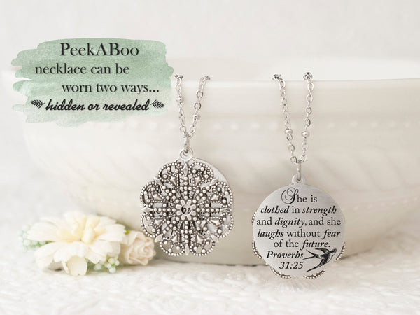 She is clothed in strength and dignity, and she laughs without fear of the future. Proverbs 31:25 - Silver Quote Pendant Necklace
