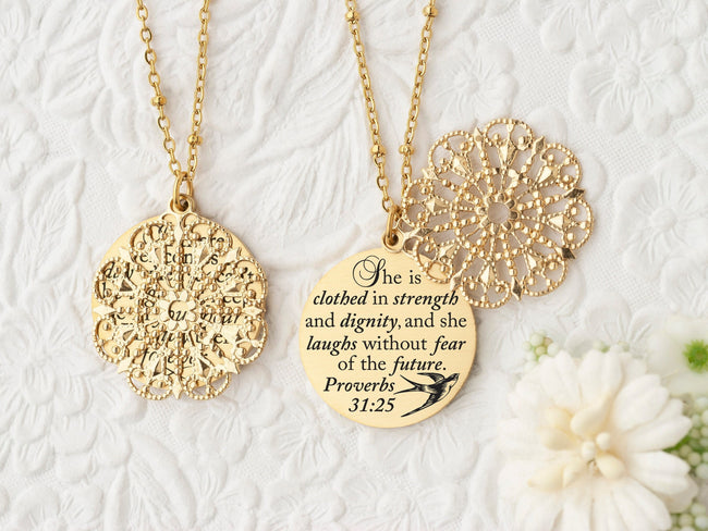 She is clothed in strength and dignity, and she laughs without fear of the future. Proverbs 31:25 - Gold Quote Pendant Necklace